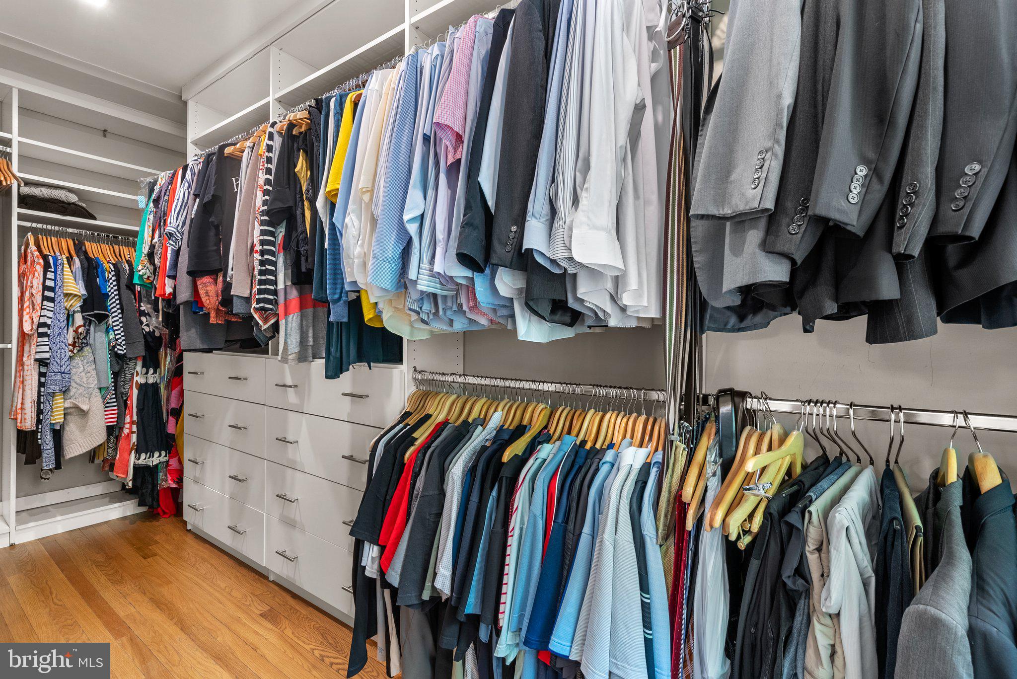 2815 39th Street Northwest Washington, DC 20007 - Photo 30 of 64 a view of walk in closet with clothes and shoes