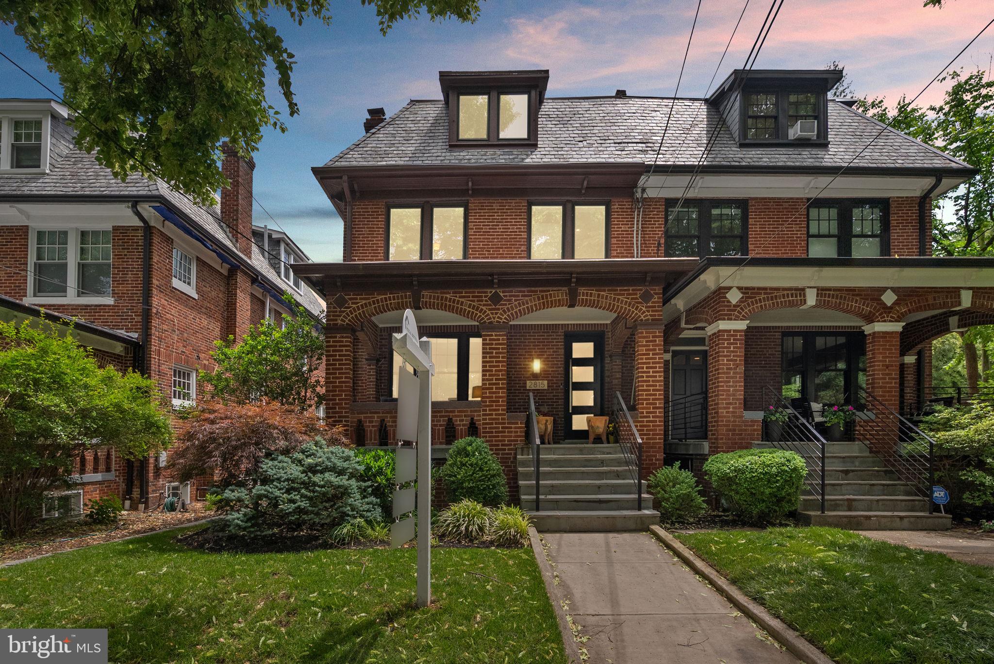 2815 39th Street Northwest Washington, DC 20007 - Photo 3 of 64 a front view of a house with garden
