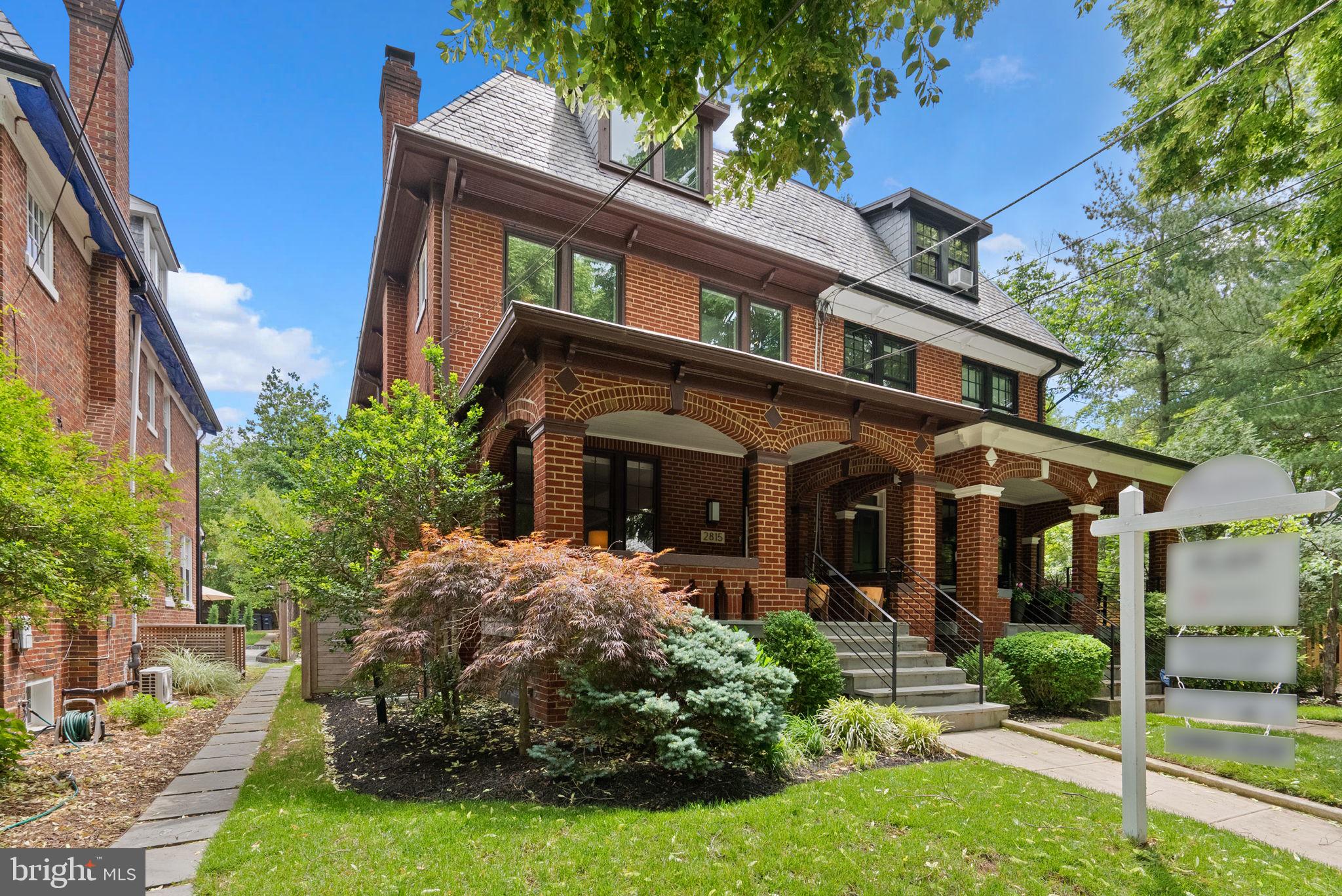 2815 39th Street Northwest Washington, DC 20007 - Photo 4 of 64 a front view of a house with garden