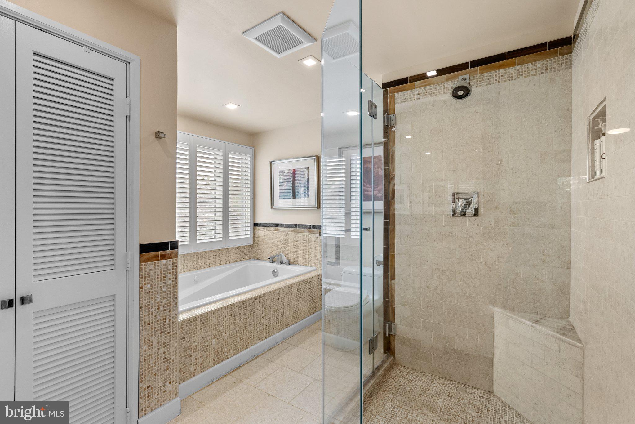 2815 39th Street Northwest Washington, DC 20007 - Photo 42 of 64 a bathroom with a tub shower and sink