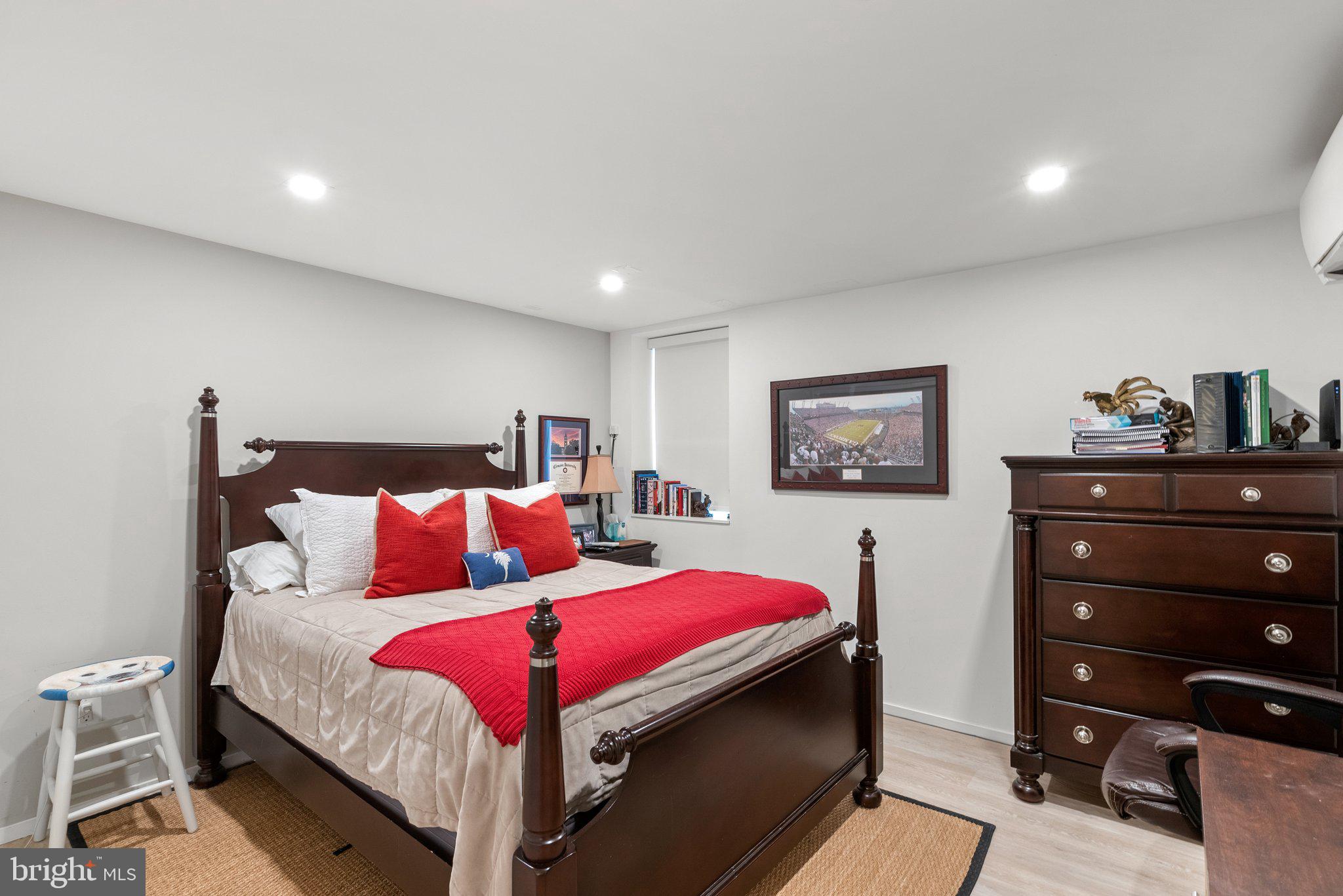 2815 39th Street Northwest Washington, DC 20007 - Photo 51 of 64 a bedroom with a bed and a dresser