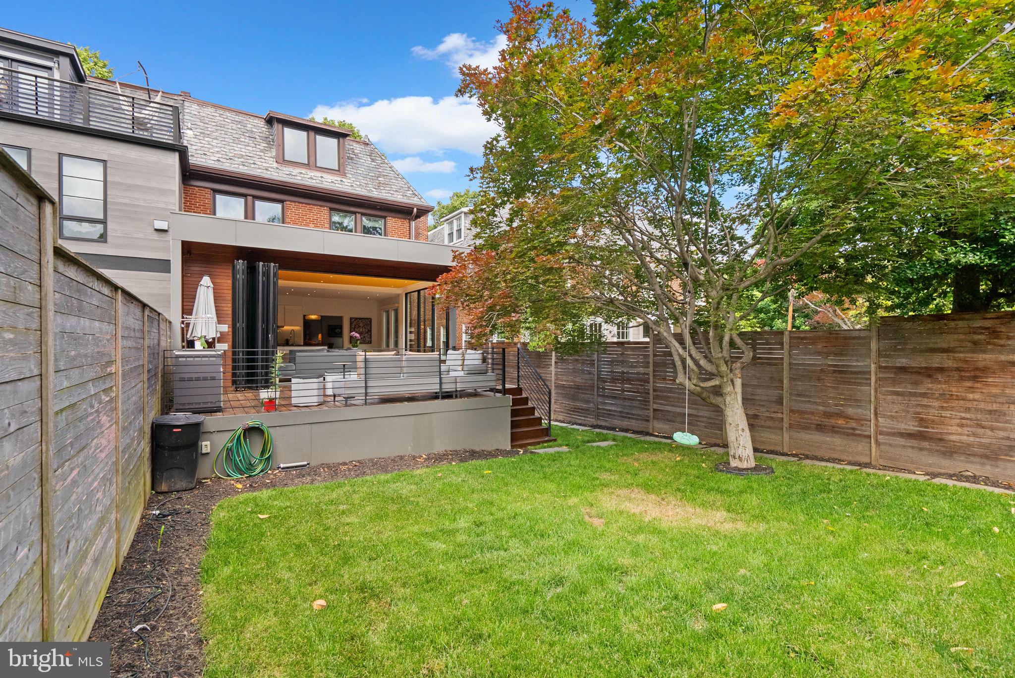 2815 39th Street Northwest Washington, DC 20007 - Photo 55 of 64 a view of a house with a yard and sitting area