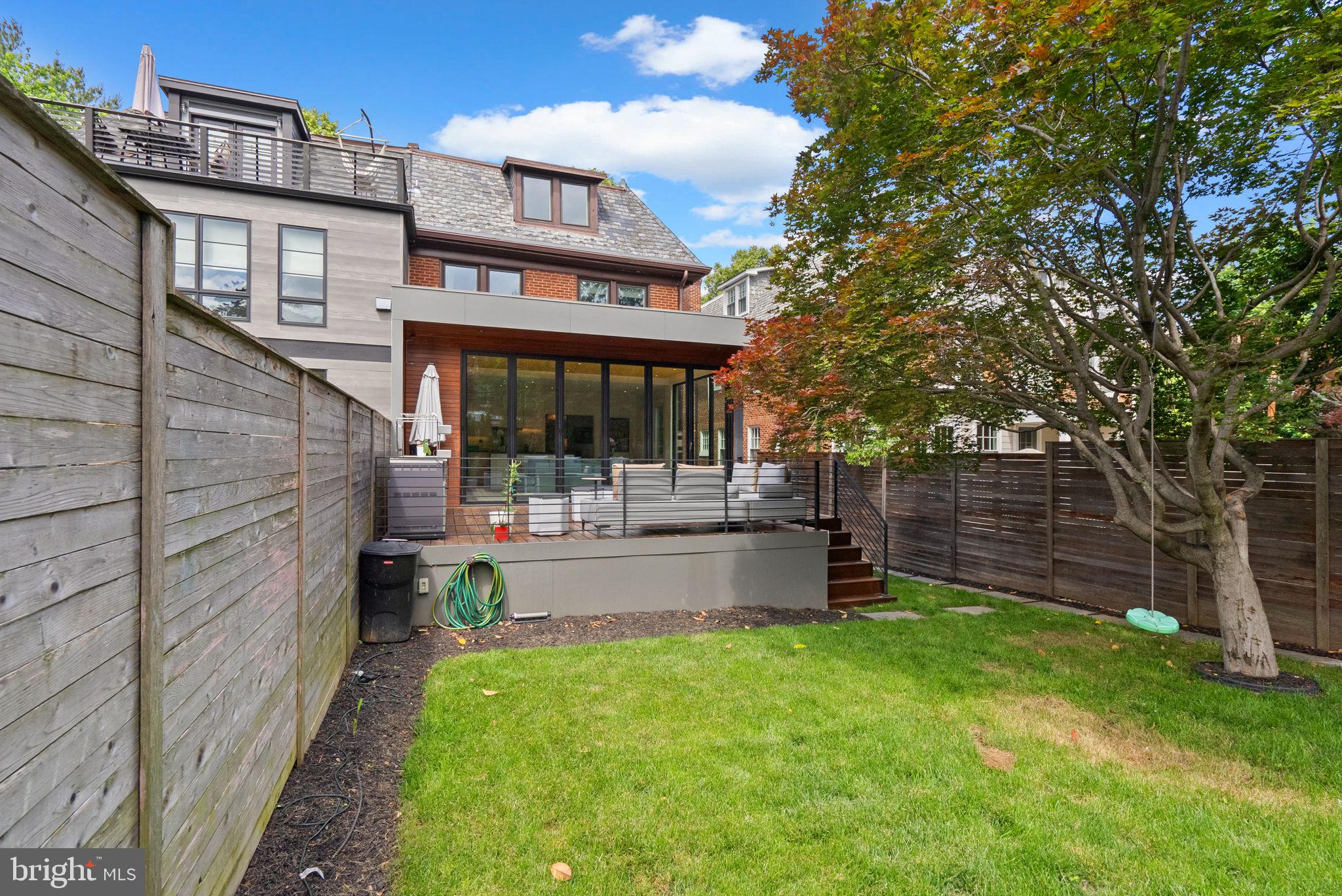 2815 39th Street Northwest Washington, DC 20007 - Photo 56 of 64 a view of a house with a yard