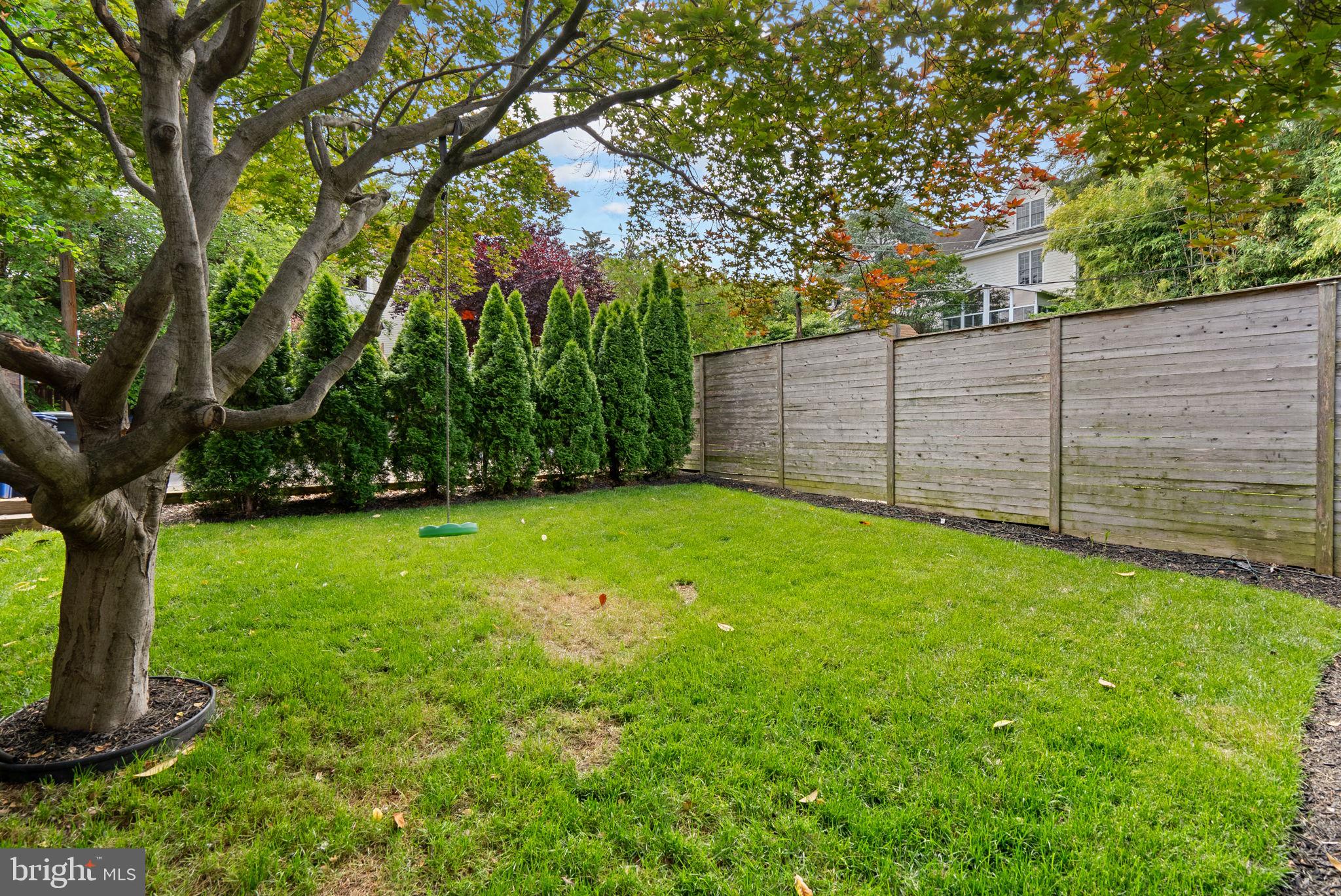 2815 39th Street Northwest Washington, DC 20007 - Photo 58 of 64 a view of a backyard with large trees