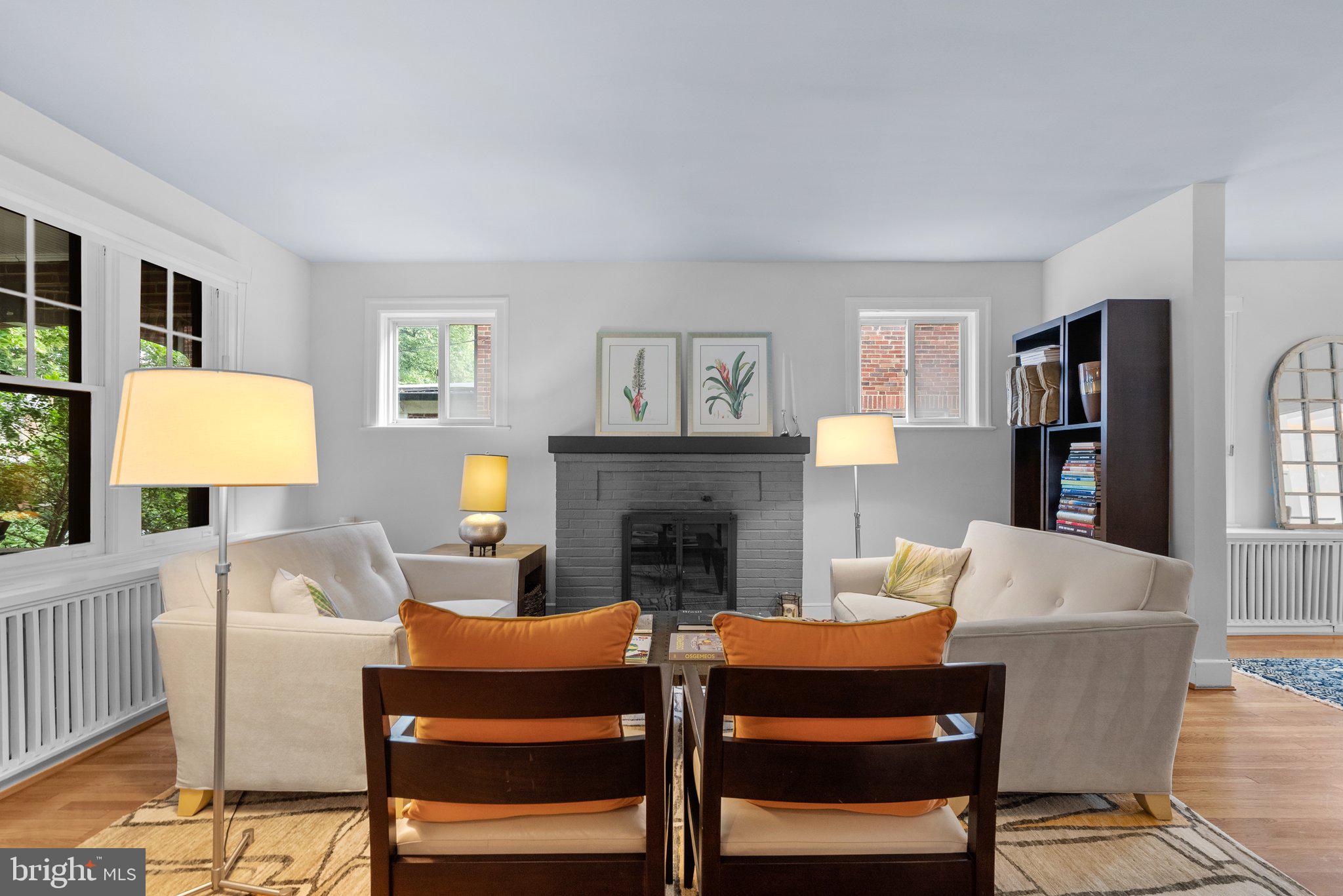 2815 39th Street Northwest Washington, DC 20007 - Photo 7 of 64 a living room with furniture a fireplace and a window