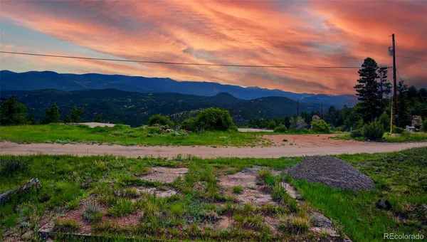 a view of an outdoor space and mountain view