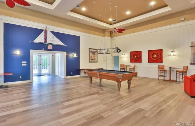 a living room with fireplace furniture and a fireplace