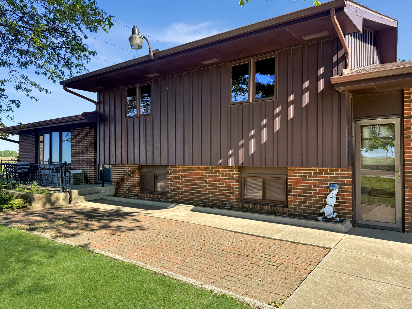 2052 County Road 3000 North Rantoul, IL 61866 - Photo 4 of 21 a house view with a backyard
