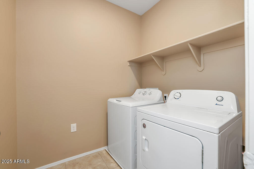 28414 Cinnabar Road San Tan Valley, AZ 85143 - Photo 19 of 32 a utility room with dryer and washer