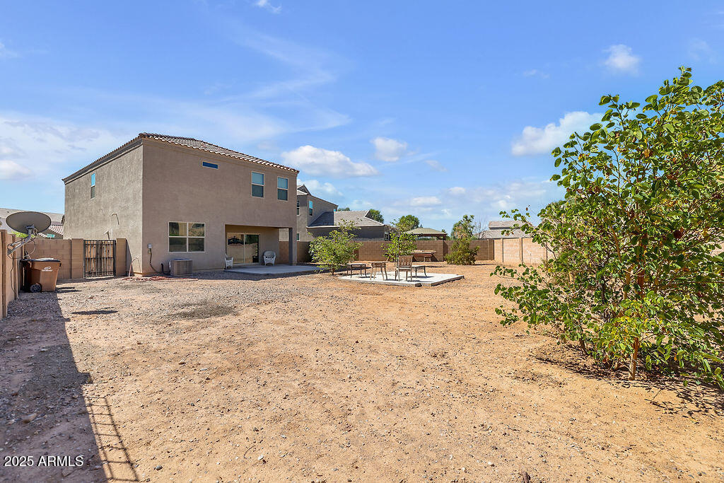 28414 Cinnabar Road San Tan Valley, AZ 85143 - Photo 30 of 32 a view of a house with a yard