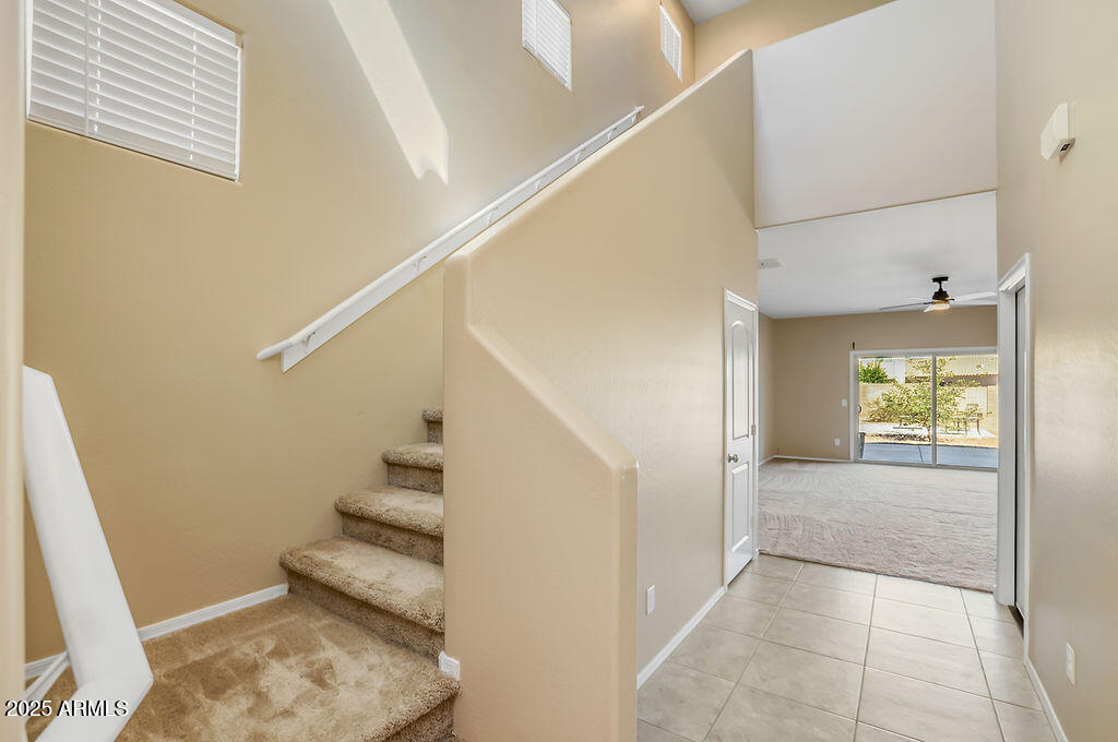 28414 Cinnabar Road San Tan Valley, AZ 85143 - Photo 4 of 32 a view of entryway and hall with wooden floor