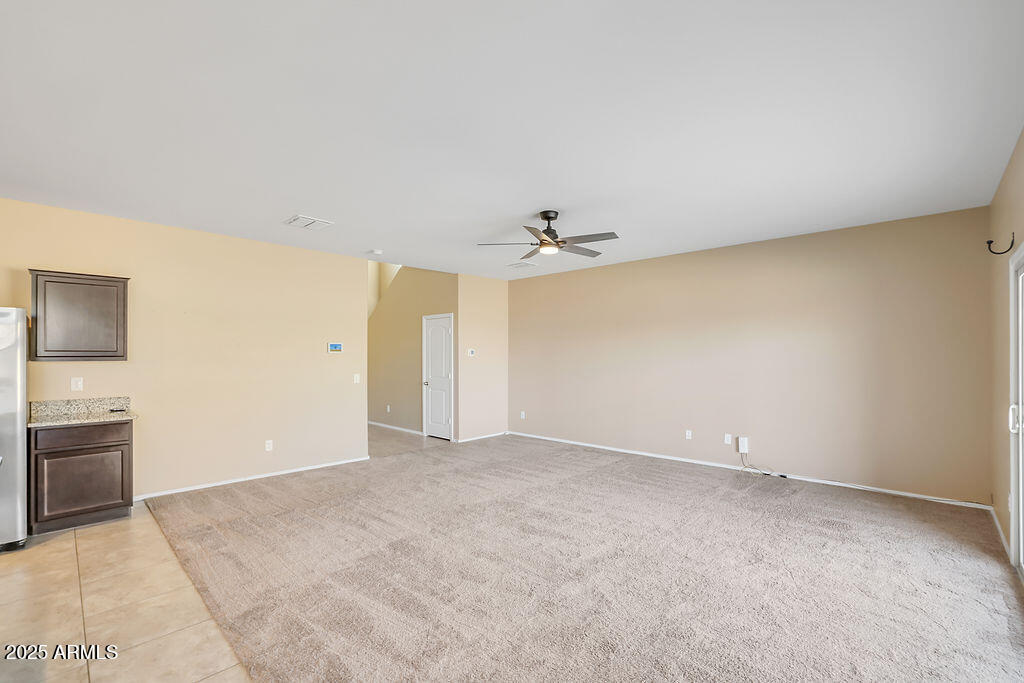 28414 Cinnabar Road San Tan Valley, AZ 85143 - Photo 7 of 32 an empty room with a bathroom