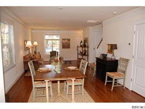 519 Jetton Street Davidson, NC 28036 - Photo 4 of 13 a dining room with furniture and wooden floor