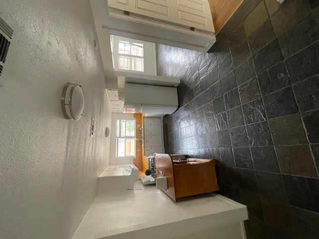 1105 1/2 Tillery Street Austin, TX 78702 - Photo 10 of 19 a kitchen with a sink a counter space and cabinets