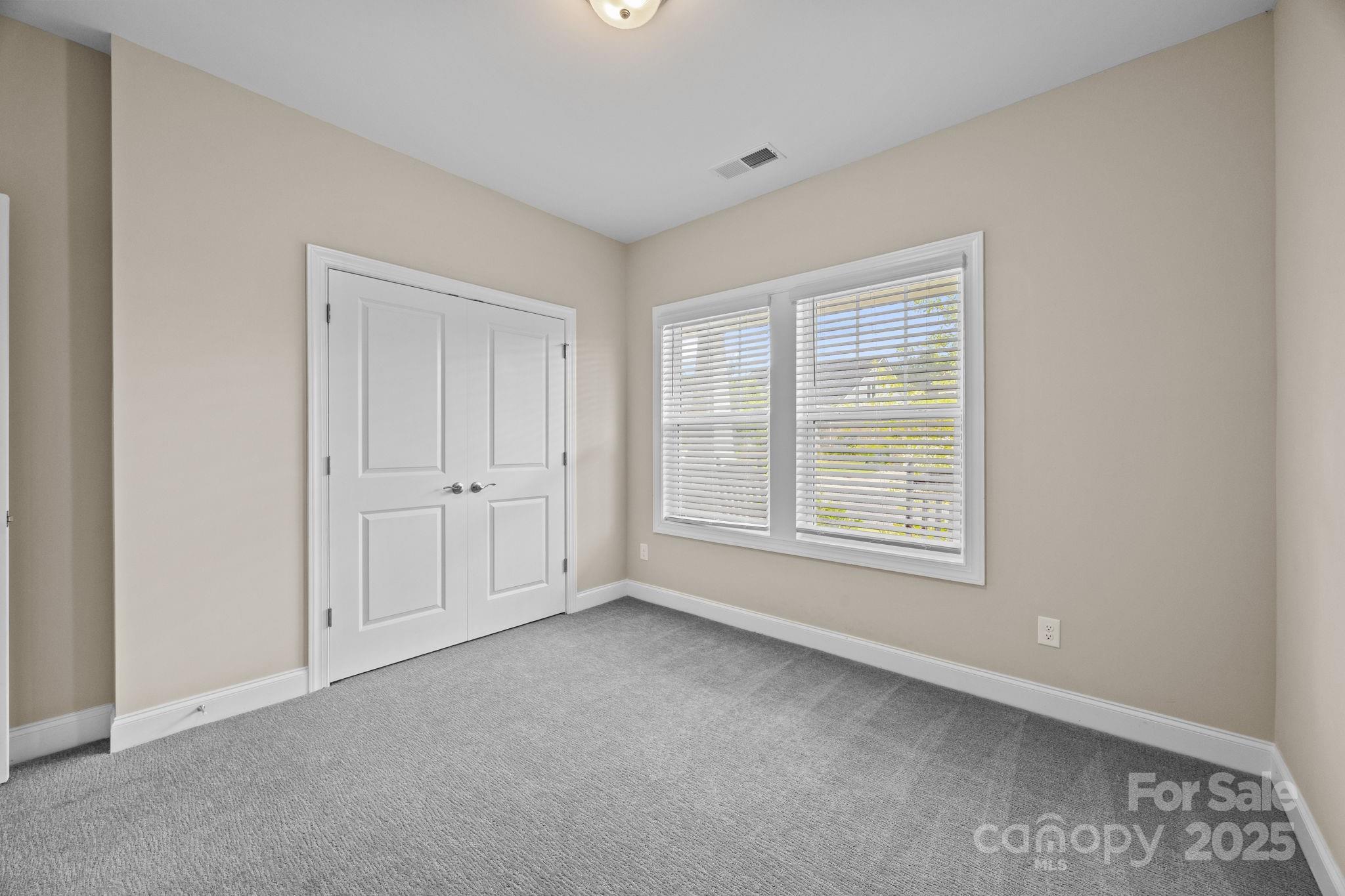 5240 Birchhill Road Mint Hill, NC 28227 - Photo 15 of 48 a view of an empty room with a window