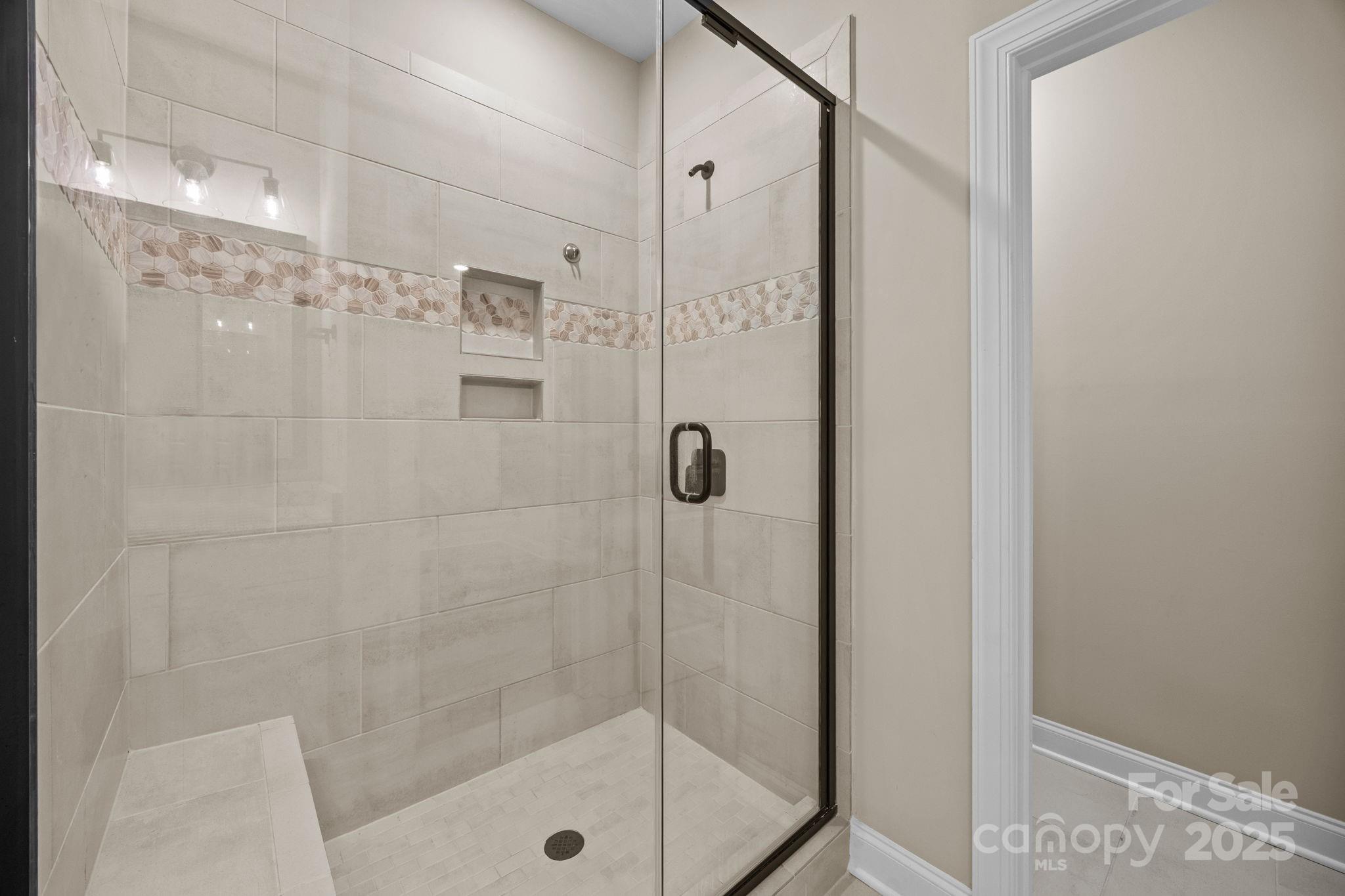 5240 Birchhill Road Mint Hill, NC 28227 - Photo 27 of 48 a bathroom with a shower