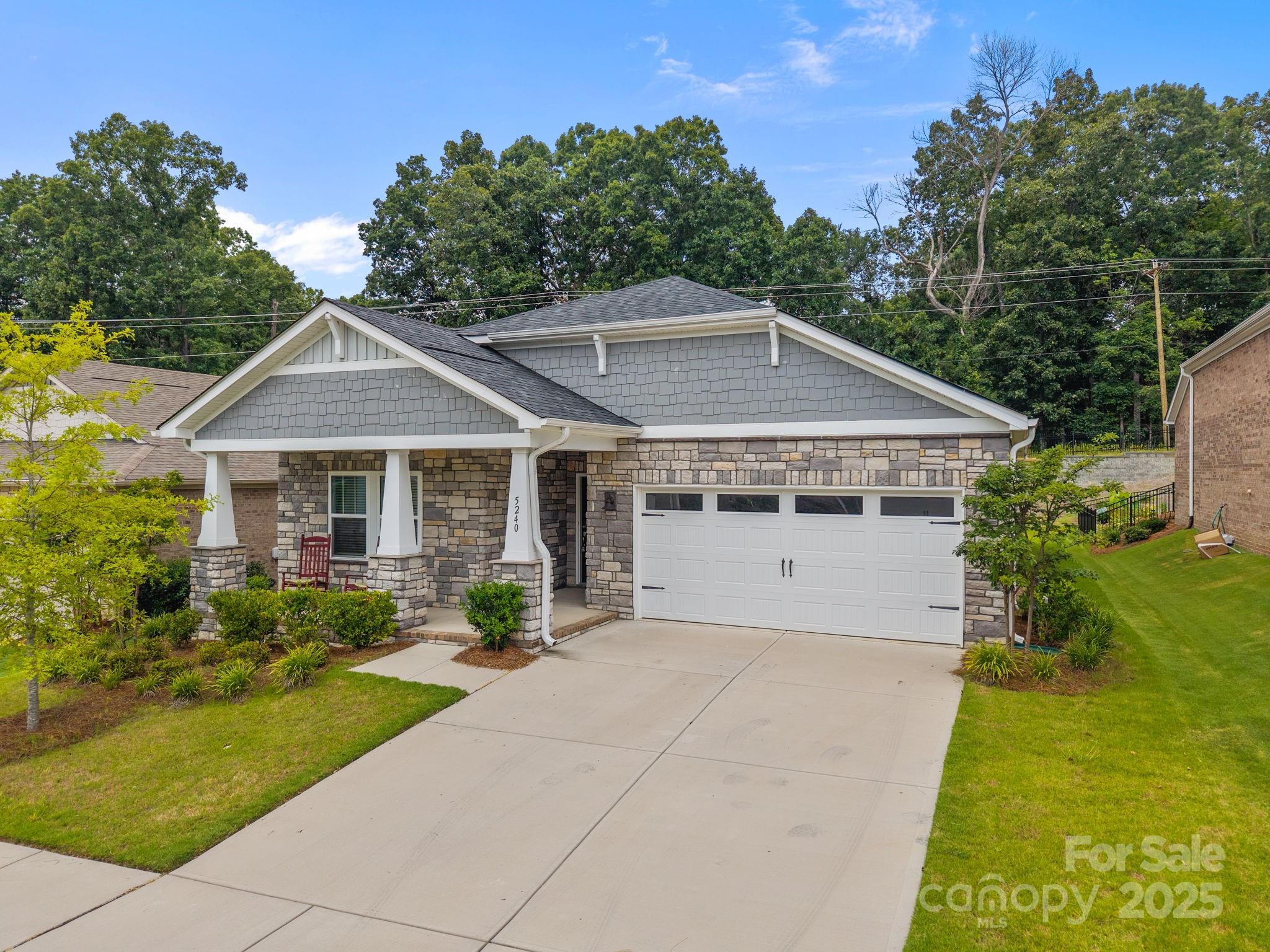 5240 Birchhill Road Mint Hill, NC 28227 - Photo 3 of 48 a front view of a house with garden