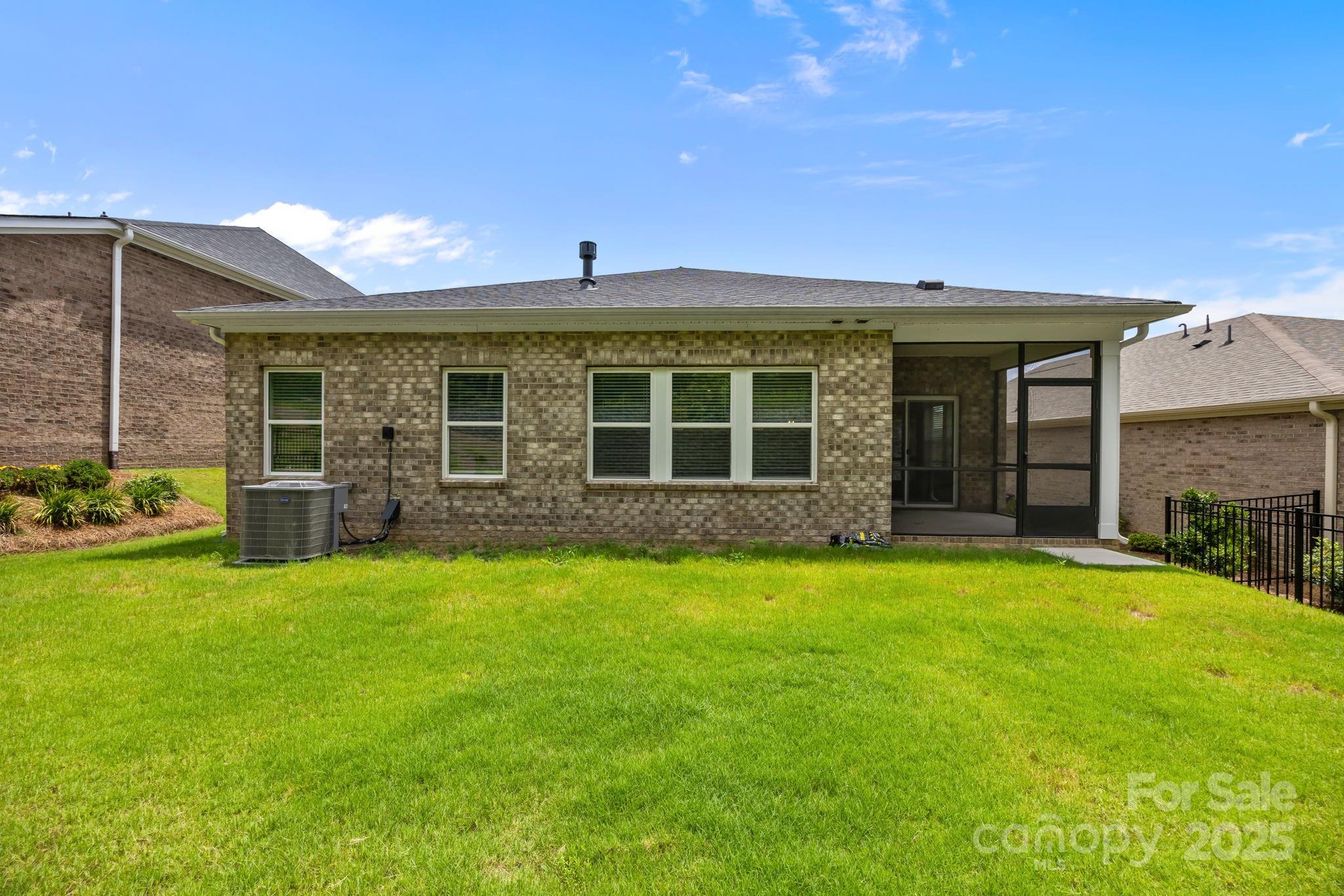 5240 Birchhill Road Mint Hill, NC 28227 - Photo 45 of 48 a front view of a house with a yard