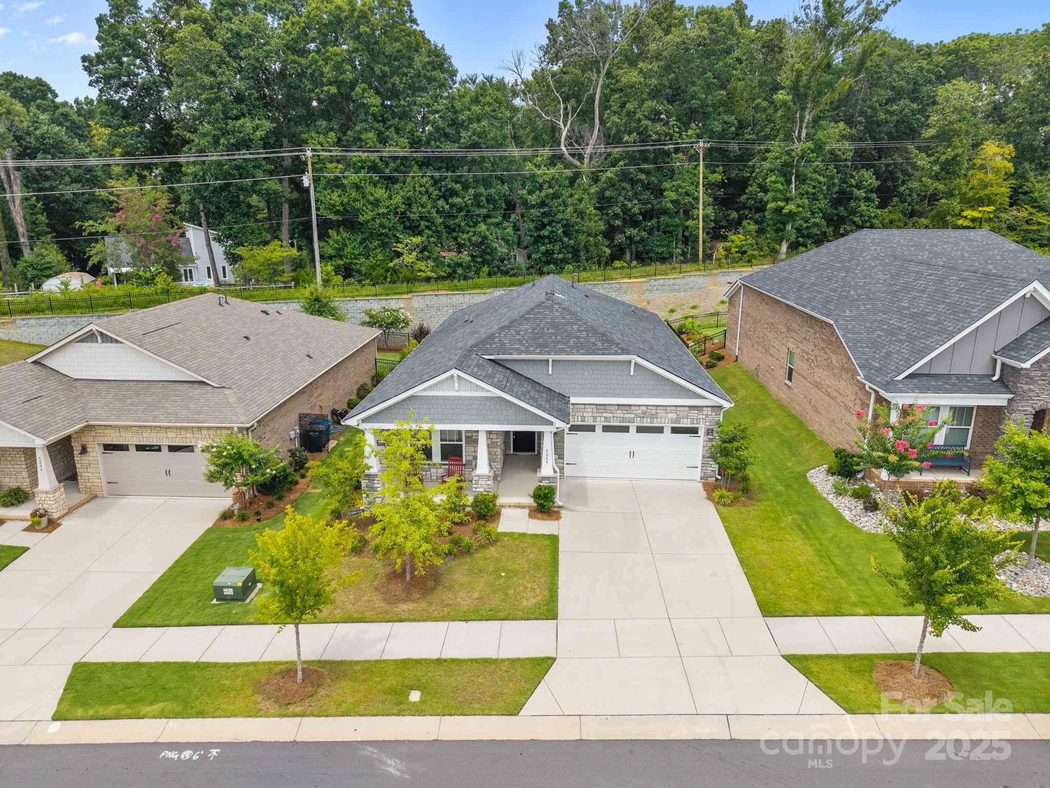 5240 Birchhill Road Mint Hill, NC 28227 - Photo 5 of 48 an aerial view of a house with swimming pool