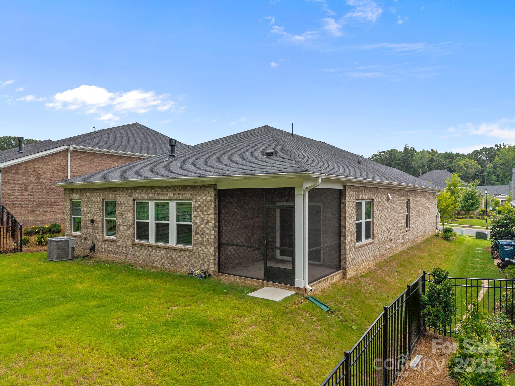 5240 Birchhill Road Mint Hill, NC 28227 - Photo 9 of 48 a view of a house with a garden and yard