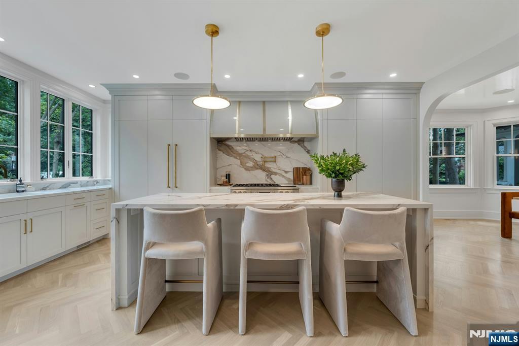 84 Watchung Avenue Montclair, NJ 07043 - Photo 19 of 48 a kitchen with a table and chairs in it
