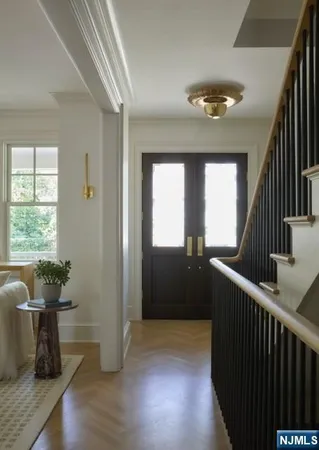 a view of balcony with wooden floor