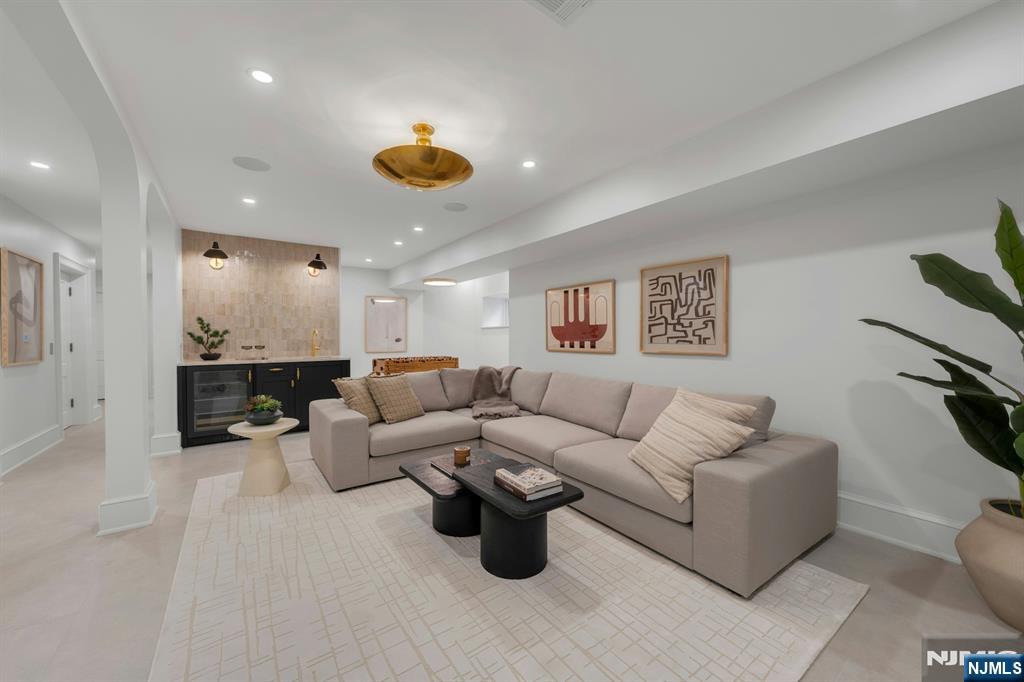 84 Watchung Avenue Montclair, NJ 07043 - Photo 37 of 48 a living room with furniture and a wooden floor
