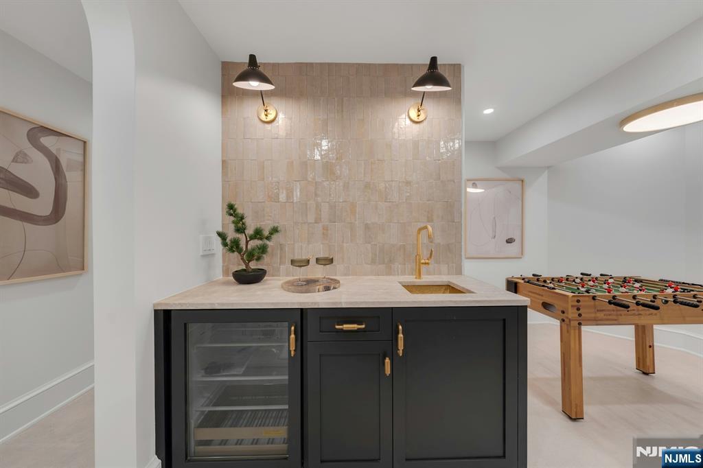 84 Watchung Avenue Montclair, NJ 07043 - Photo 38 of 48 a bathroom with a sink and a mirror