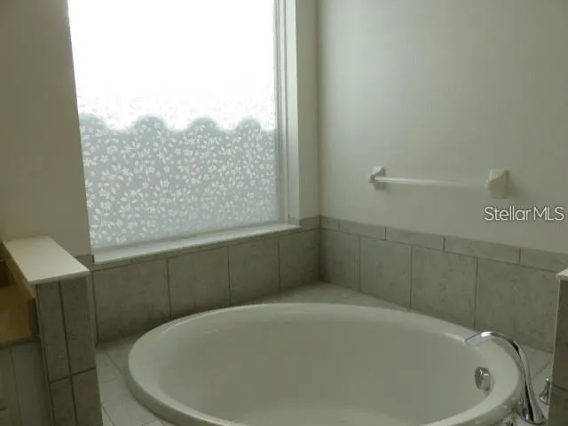 a bathroom with a bathtub
