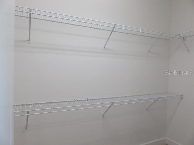 6915 Indus Valley Circle Parrish, FL 34219 - Photo 15 of 38 a view of a room with racks on the wall