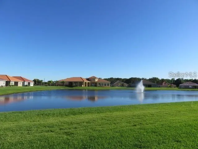 a view of a lake with a city