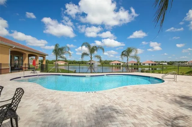 a view of a swimming pool and outdoor space
