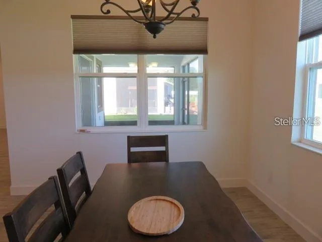 a view of a livingroom with furniture and window