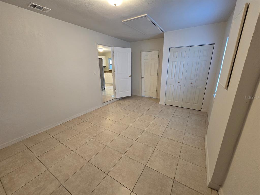 3406 Murrow Street New Port Richey, FL 34655 - Photo 14 of 21 a view of an empty room and closet area