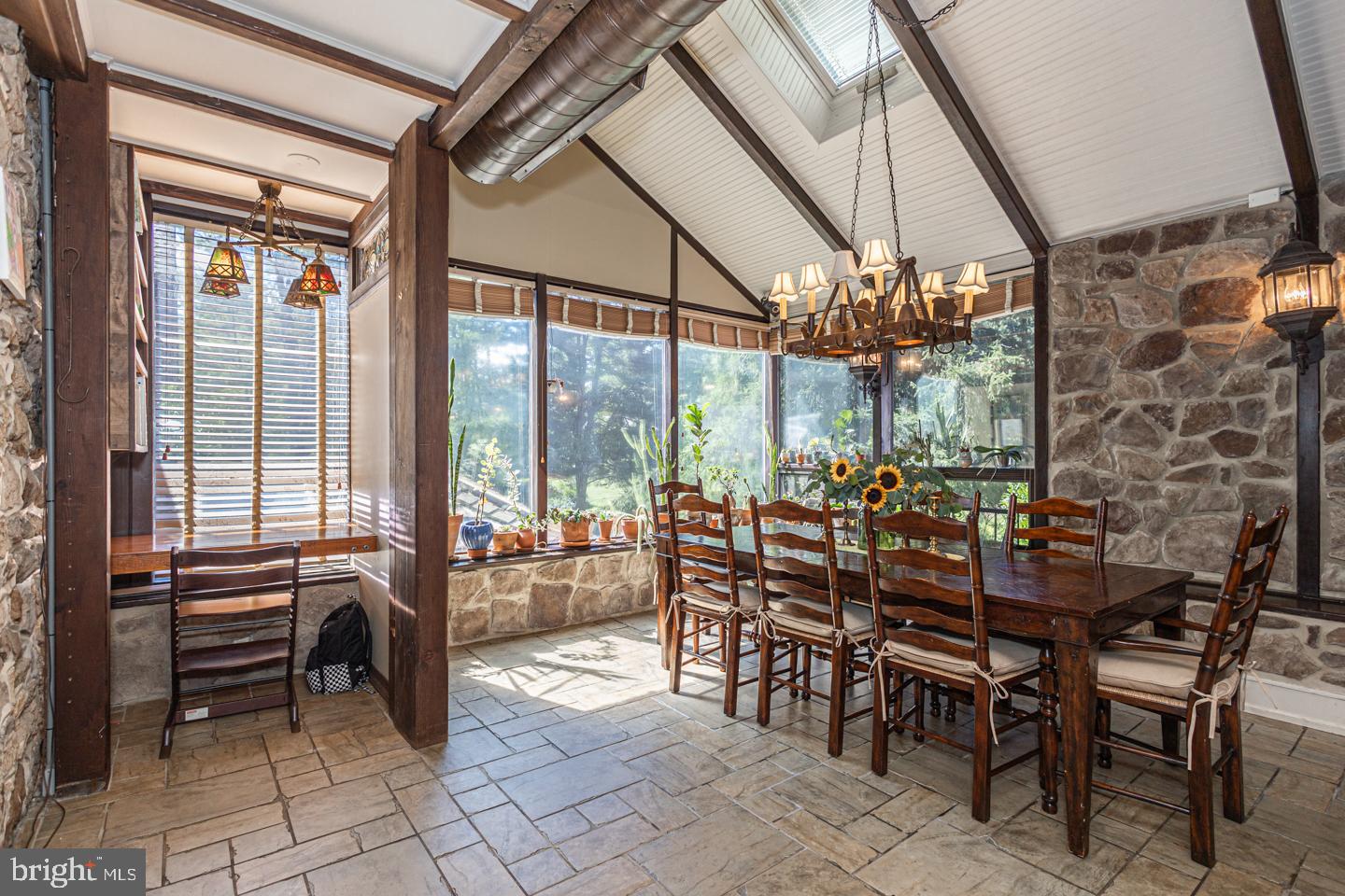 3111 Burnt House Hill Road Doylestown, PA 18902 - Photo 13 of 45 a view of a dining room with furniture large windows and wooden floor