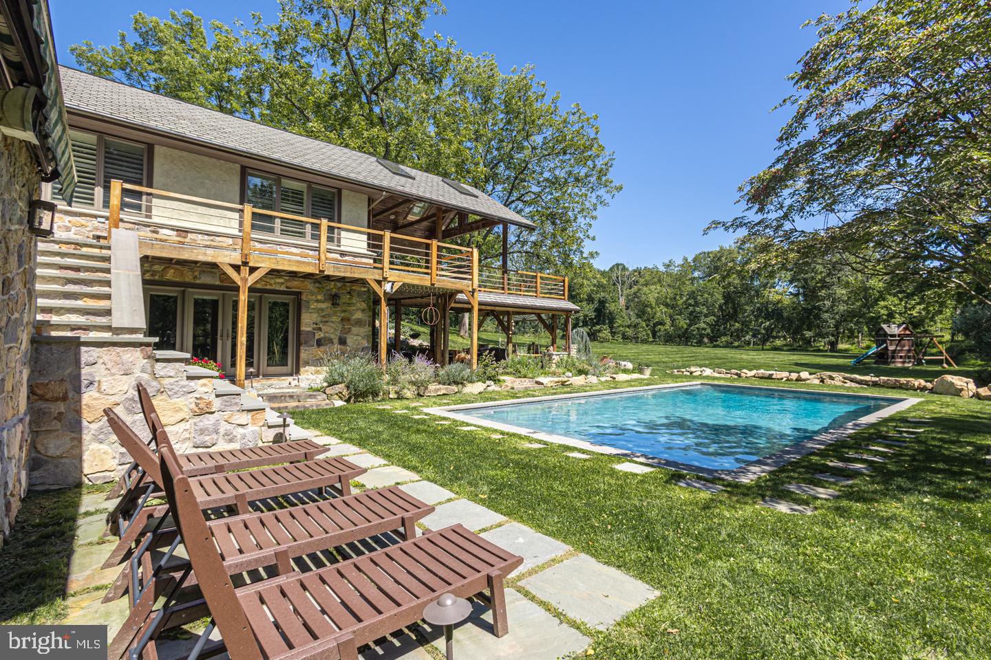 3111 Burnt House Hill Road Doylestown, PA 18902 - Photo 33 of 45 a view of a house with pool and sitting area