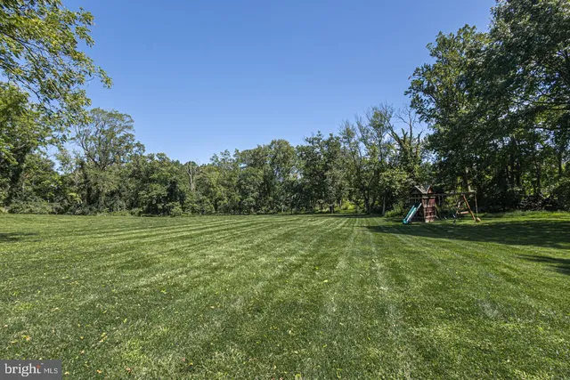 front view of a house with a garden