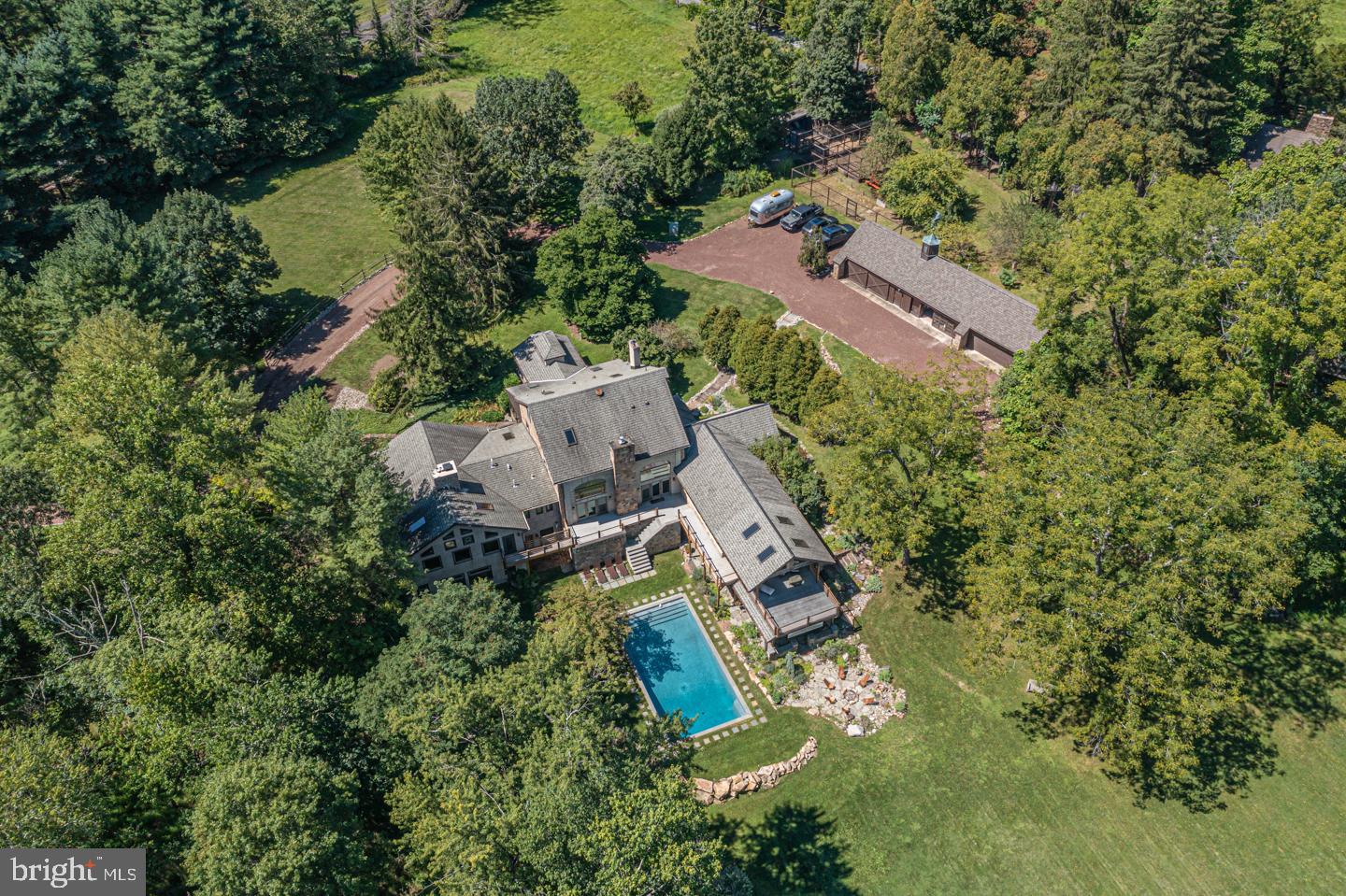 3111 Burnt House Hill Road Doylestown, PA 18902 - Photo 5 of 45 an aerial view of a house with outdoor space and a lake view