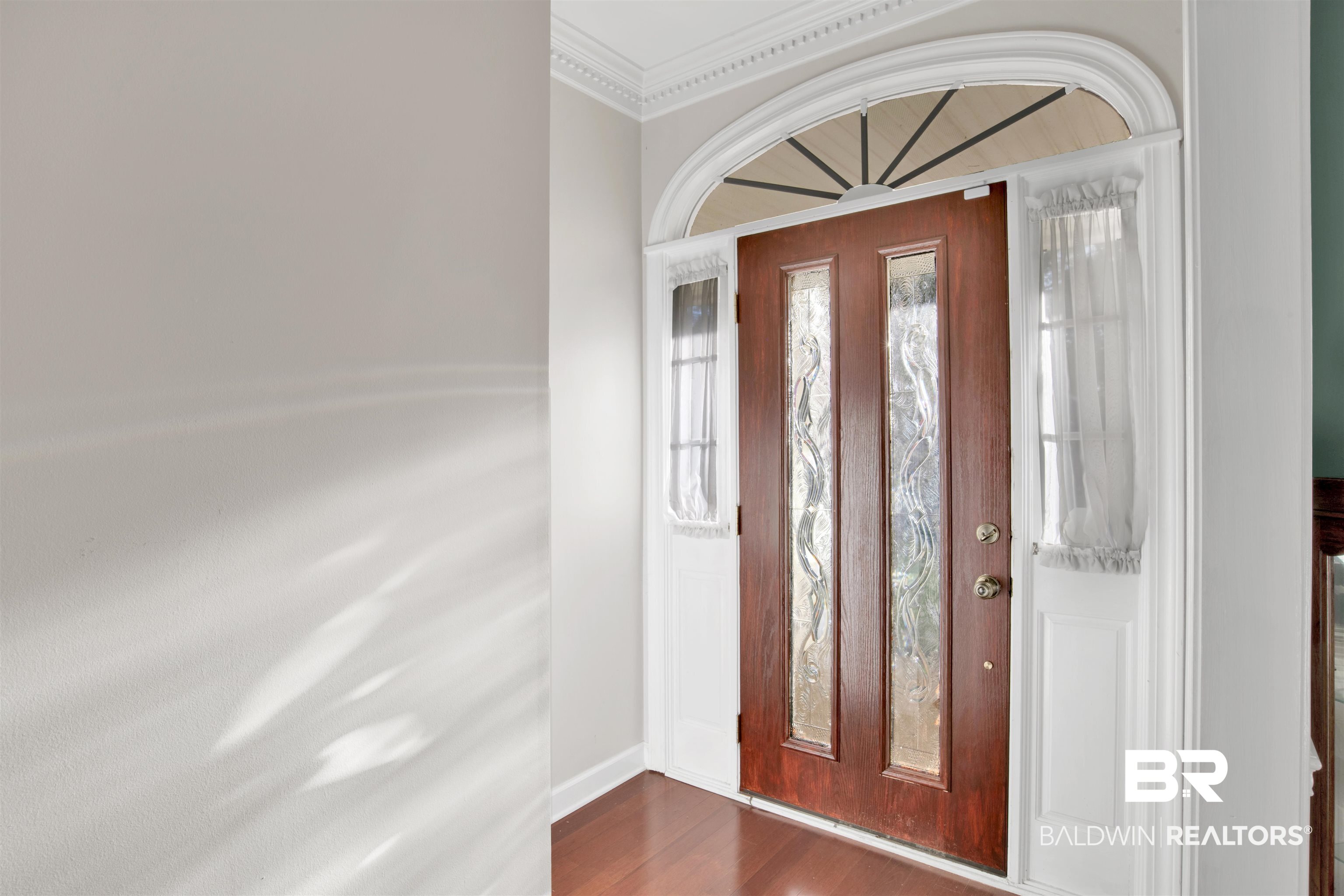 445 Wedgefield Drive South Mobile, AL 36608 - Photo 9 of 36 Foyer entrance with hardwood / wood-style flooring and ornamental molding