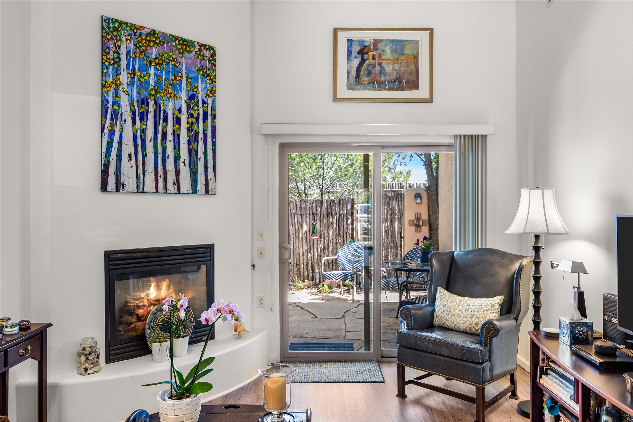 500 Rodeo Road, Unit 1212 Santa Fe, NM 87505 - Photo 6 of 16 Livingroom with fireplace and view to courtyard