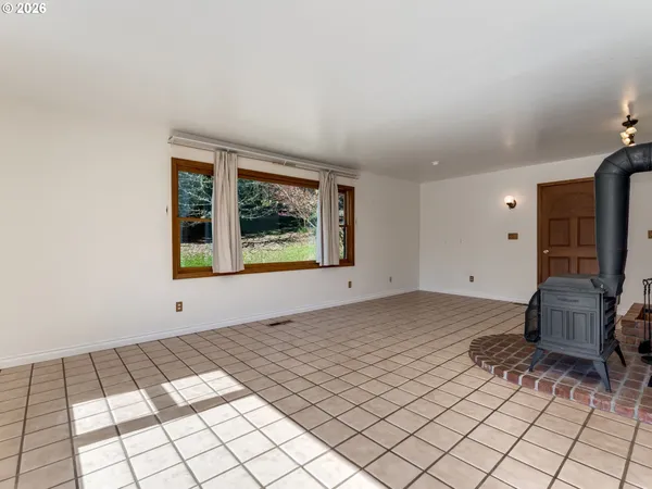 a view of an empty room and window
