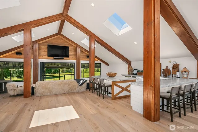 a very nice looking living room with a large window