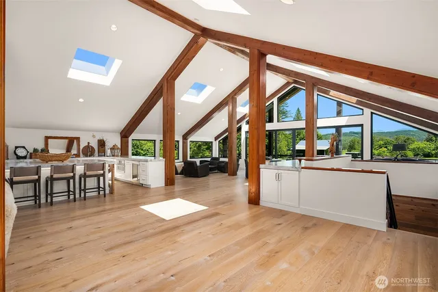 a very nice looking living room with a large window