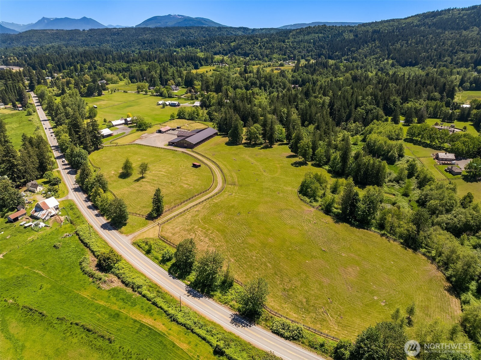 31405 Redmond-Fall City Road Southeast Fall City, WA 98024 - Photo 27 of 32 a view of a swimming pool with a lake view