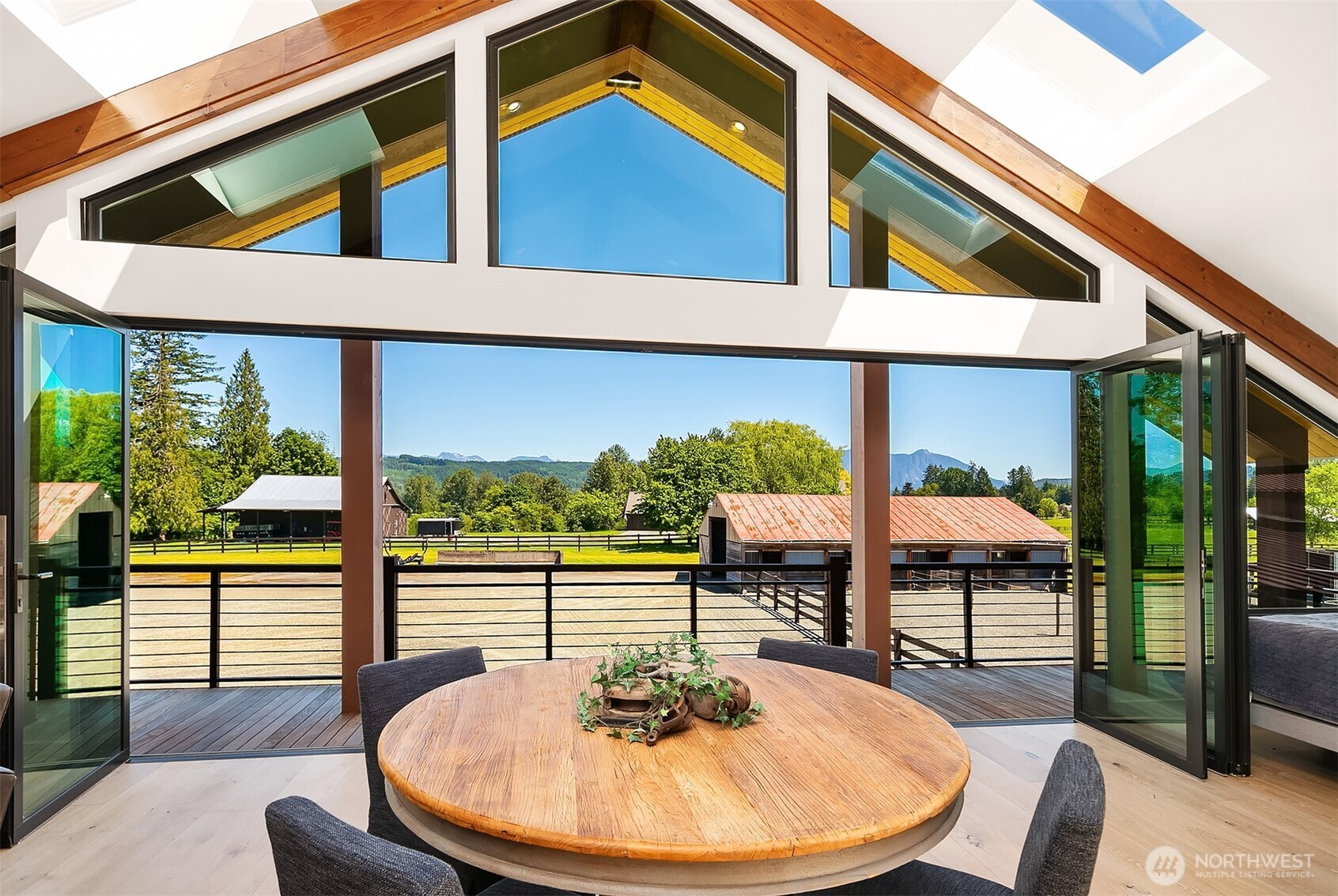 31405 Redmond-Fall City Road Southeast Fall City, WA 98024 - Photo 10 of 32 a view of a patio with a table and chairs