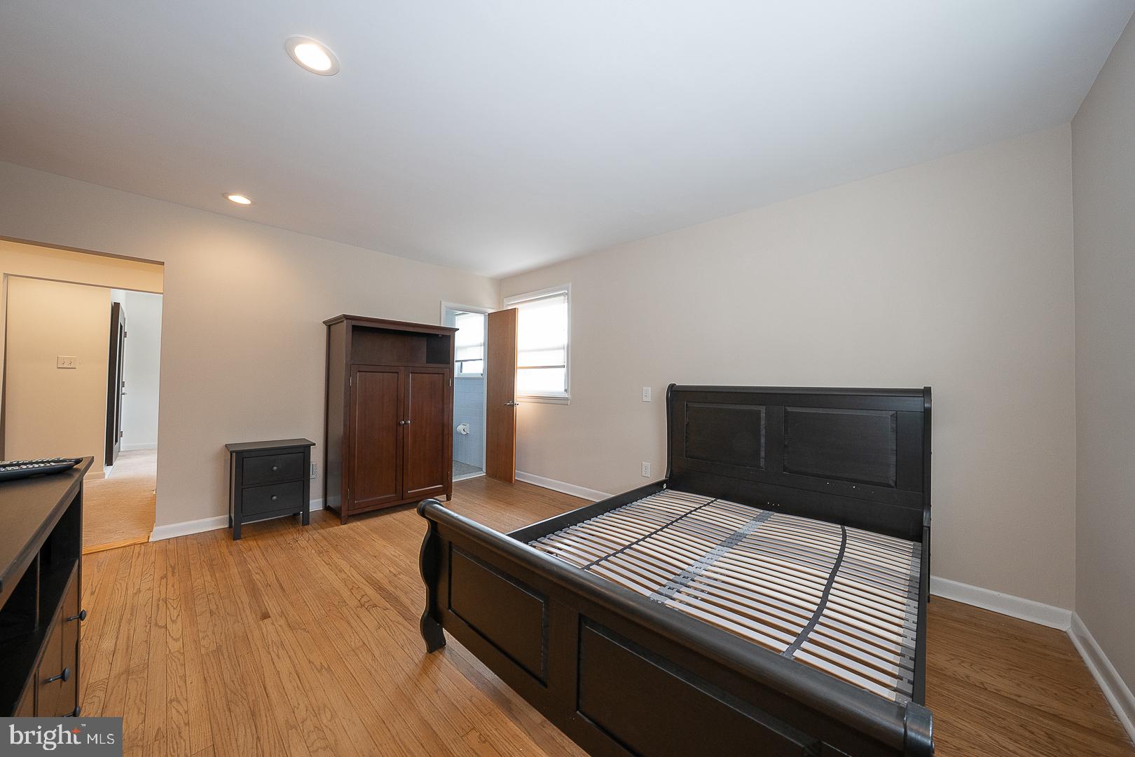 20 Fairview Road Swarthmore, PA 19081 - Photo 24 of 57 a bedroom with a bed and a flat screen tv