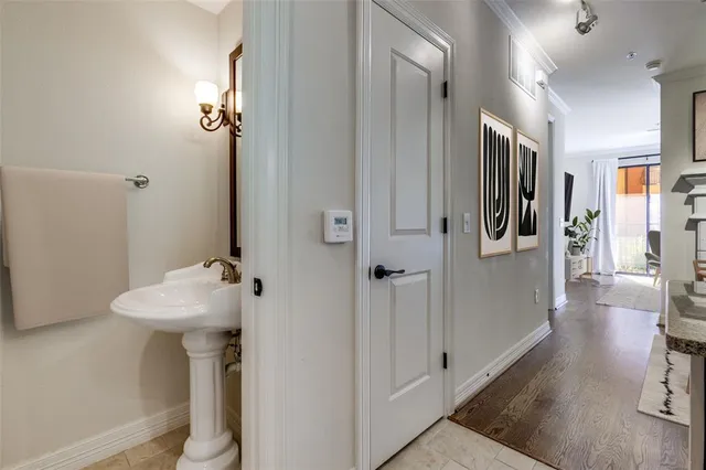 a bathroom with a sink and mirror