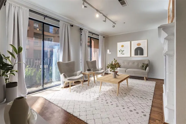 a living room with furniture and a table