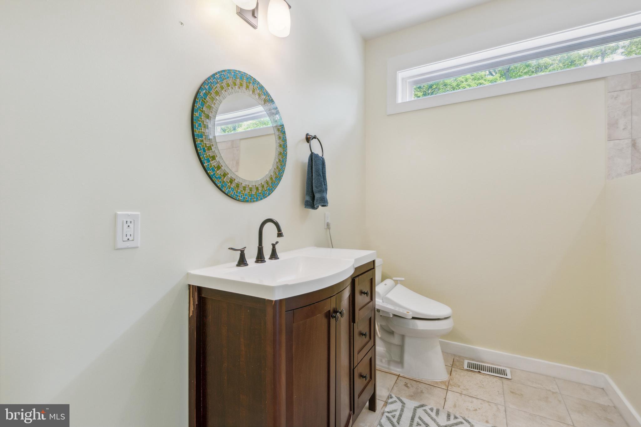 803 Norwood Road Silver Spring, MD 20905 - Photo 11 of 56 Full bath accessible from hall entryway & bedroom