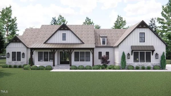 front view of a house with a yard